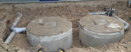 Bouw nieuwe bewaarschuur - plaatsen septictanks